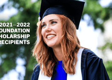 Feature Image of a Graduate dressed in her cap and gown.